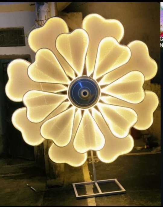 Handcrafted decorative crafts with artificial flowers, festive lanterns, and elegant ornaments for Indian celebrations