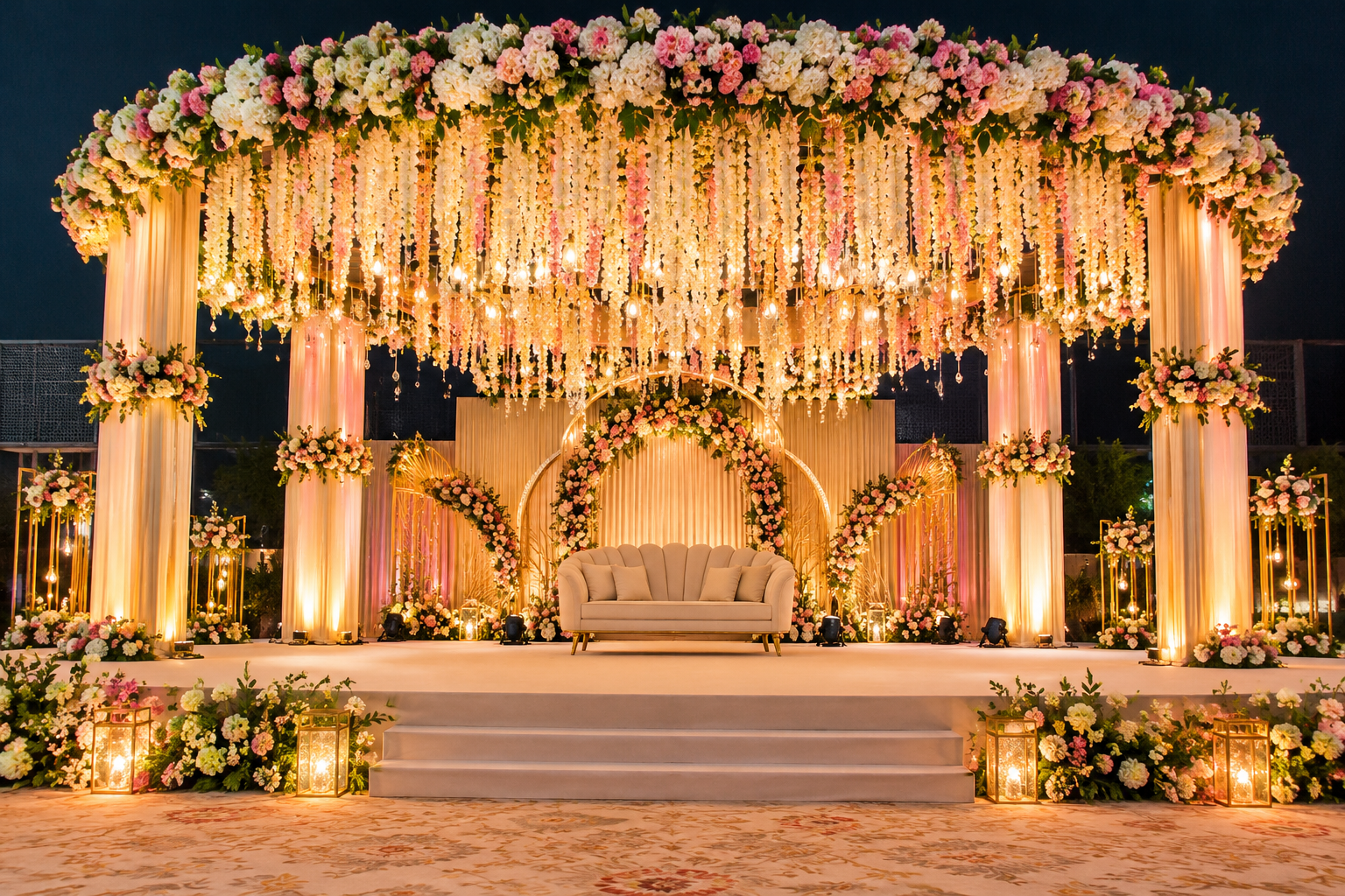 Elegant Indian wedding stage with crystal chandeliers, artificial flowers, and decorative backdrop for event décor in Madhya Pradesh